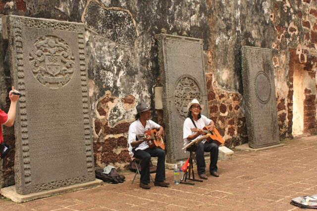 Buskers Amid the Tombstones at the Church of Saint Paul