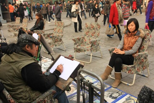 Customer Having Her Portrait Drawn in Zhongyang Street 中央街 in Haerbin 哈尔滨
