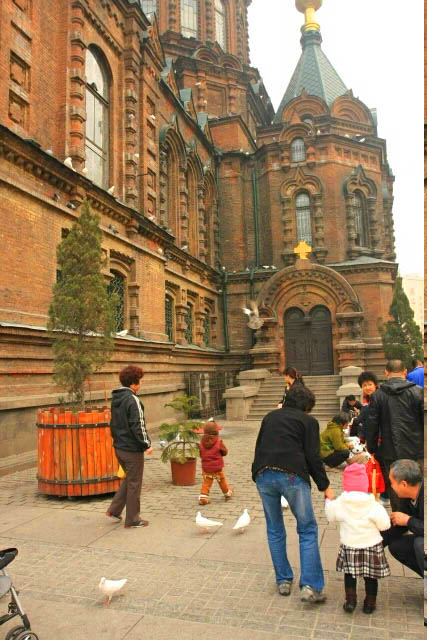 Feeding The Birds at Saint Sophia Cathedral 圣索菲亚大教堂 in Haerbin 哈尔滨