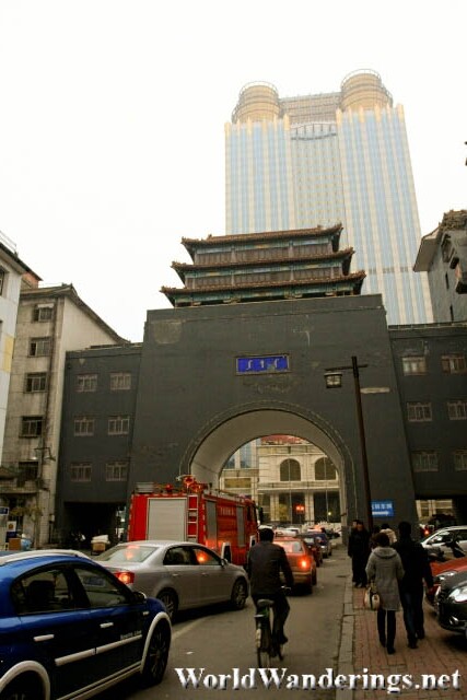 Huaiyuan Gate Dwarfed by a Skyscraper Behind It