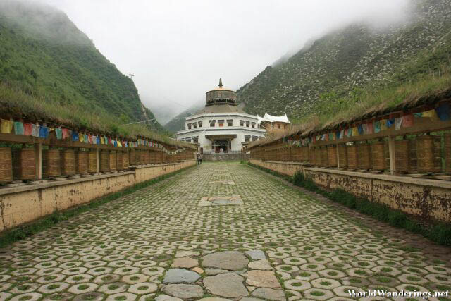 Tibetan Prayer Wheels Line the Entrance to Shika Snow Mountain 石卡雪山