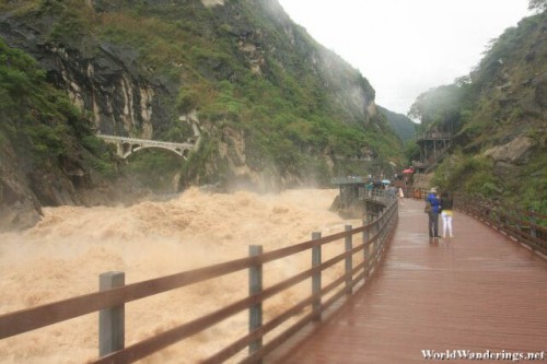 Walking Down the Viewing Platform at the Tiger Leaping Gorge 虎跳峡