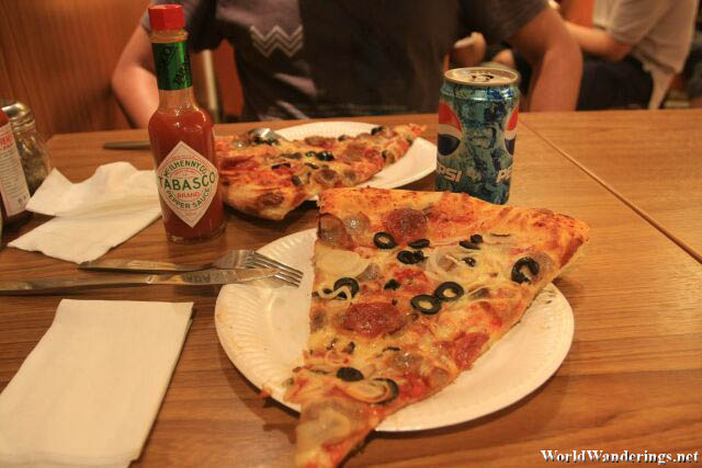 Massive Pizza Slices Somewhere in Soho in Hong Kong