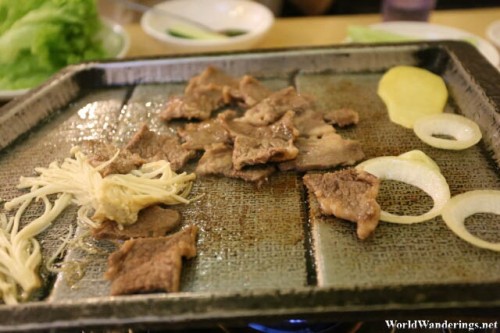 Grilling Meat at Soju Bang Korean Restaurant