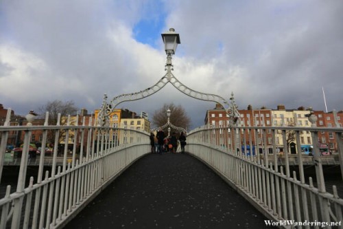 Crossing the Ha'penny Bridge in Dublin