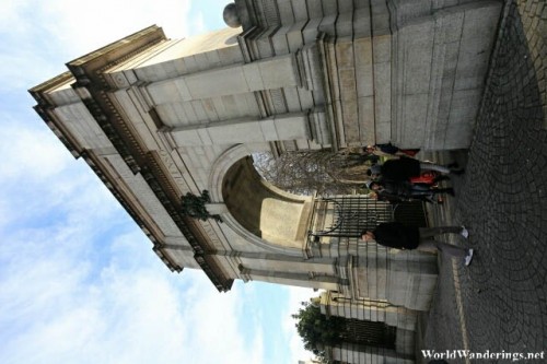 People Coming Out of the Fusilier's Arch at Saint Stephen's Green in Dublin