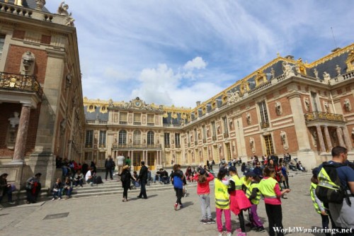 Tourists Pour out of the Chateau de Versailles
