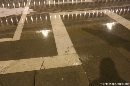 Water Seeping Through the Ground During Acqua Alta in Venice