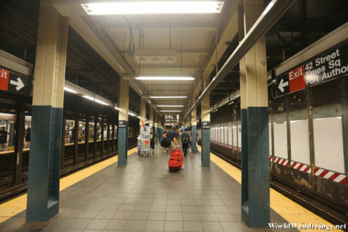 Walking Along the Platform at a New York Subway Station