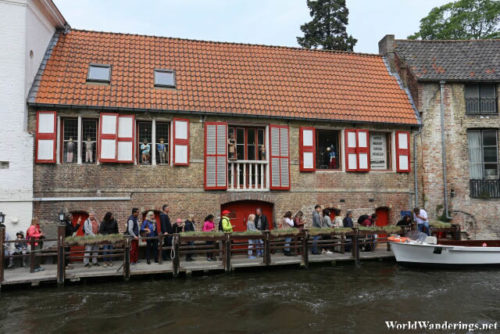 Tourists Queuing Up for a Canal Tour in Bruges