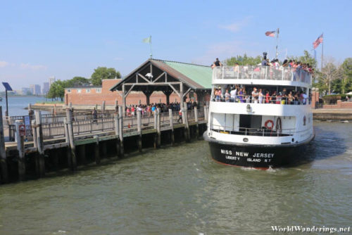 Tourist Boat Arriving at Liberty Island