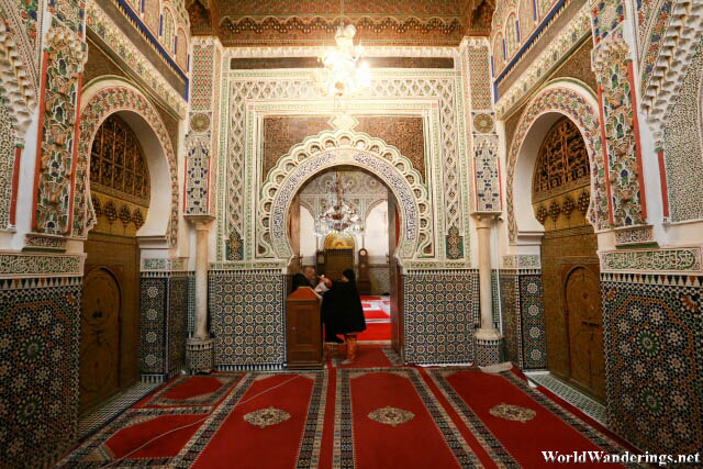 Inside the Cherratine Madrasa in Gate of the Cherratine Madrasa in Fès