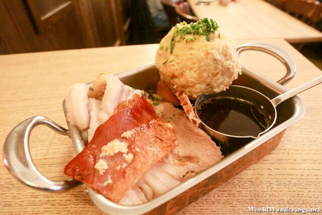 Roast Pork at the Goldene Kugel Restaurant in Salzburg